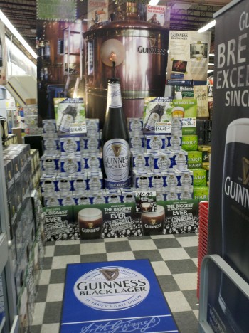 Point of sale display with pouring beer and inkjet printed graphics